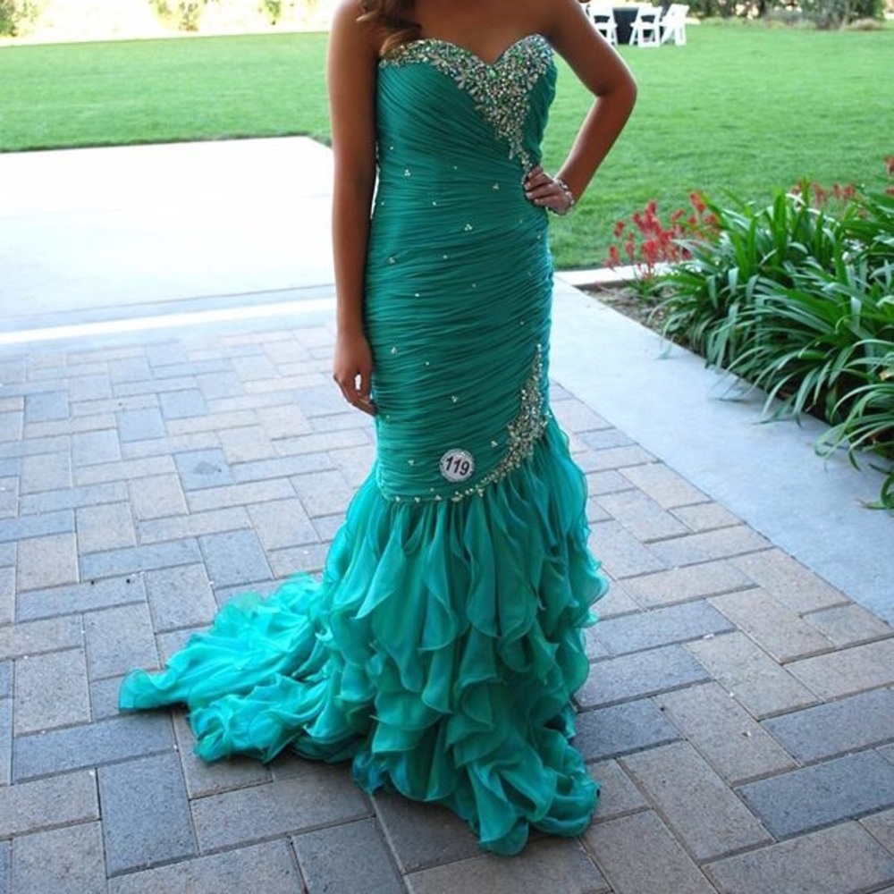 Strapless teal dress size 4. Zip up back.
